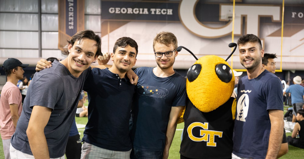 Graduate students with Yellow Jackets mascot
